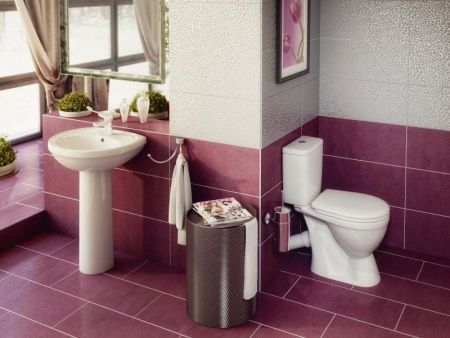 Унитаз "Лира", белый, 1кноп.,косой вып.,нижн.подв., сиденье полипропилен